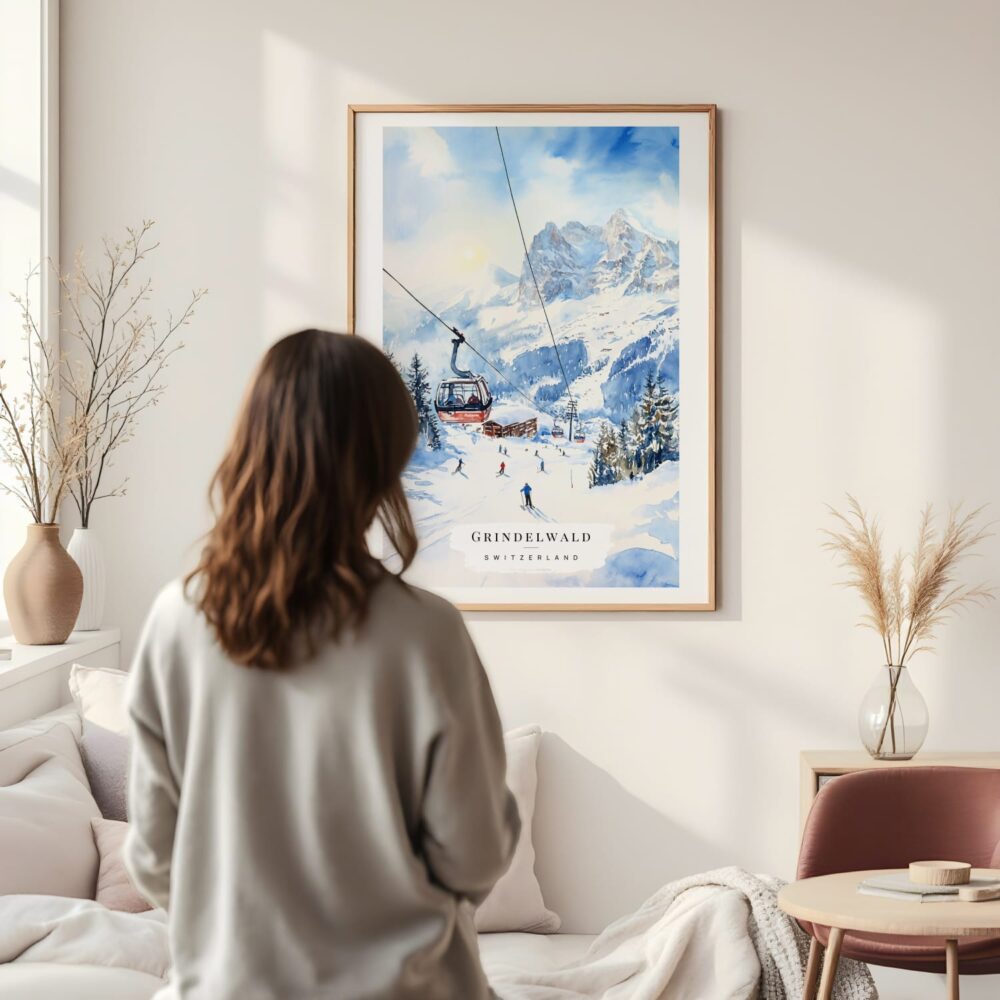Framed Skiing in Grindelwald Watercolor Wall Art - In Living Room with Woman Looking at it - Portrait Framed Skiing in Grindelwald Watercolor Wall Art - In Living Room with Woman Looking at it - Portrait