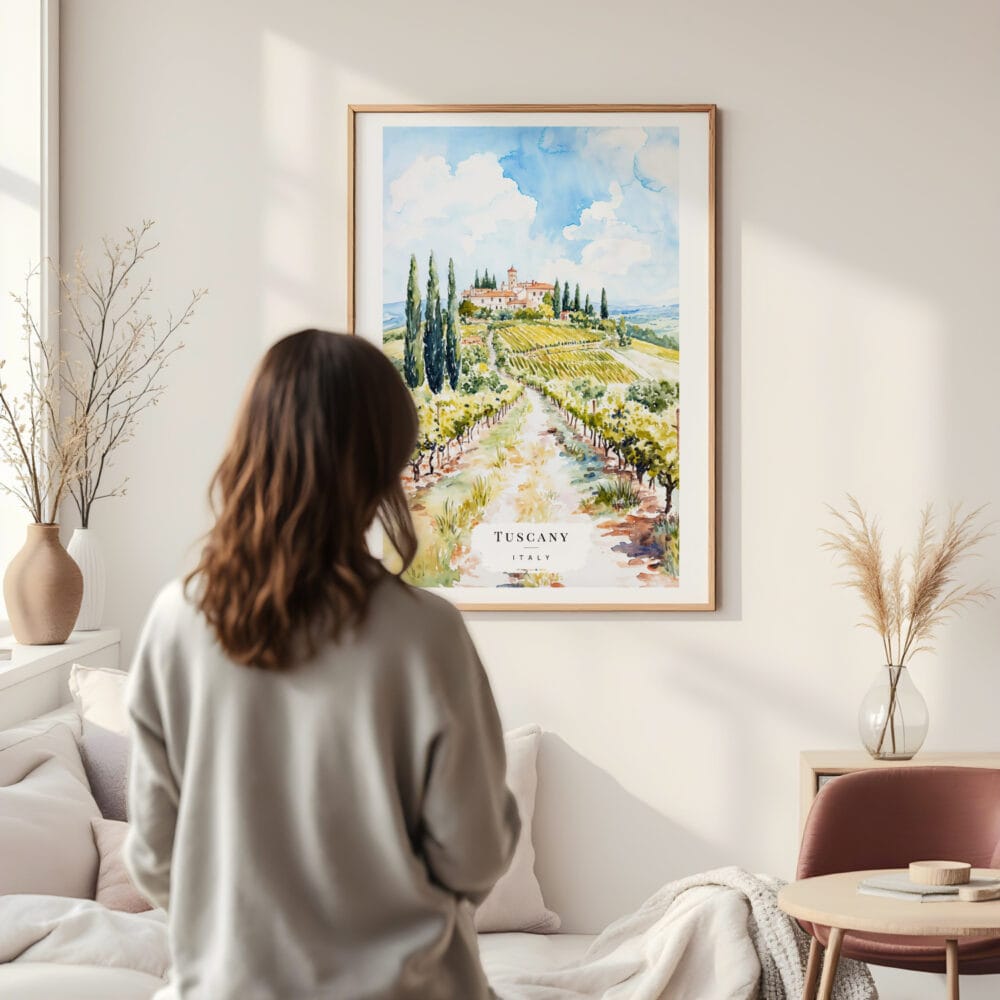 Framed Tuscany Italy Watercolor Wall Art - In Living Room with Woman Looking at it - Portrait Framed Tuscany Italy Watercolor Wall Art - In Living Room with Woman Looking at it - Portrait