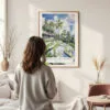 Framed Ubud Bali Rice Terrace Watercolor Wall Art - In Living Room with Woman Looking at it - Portrait