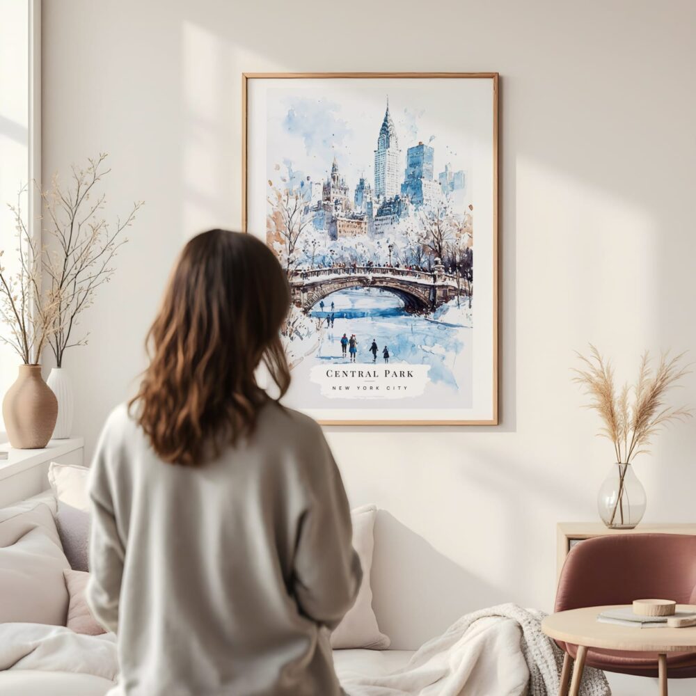 Framed White Christmas Central Park New York Watercolor in Winter Wall Art - In Living Room with Woman Looking at it - Portrait Framed White Christmas Central Park New York Watercolor in Winter Wall Art - In Living Room with Woman Looking at it - Portrait