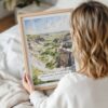 Woman Holding Framed Theodore Roosevelt National Park Watercolor Wall Art - Portrait