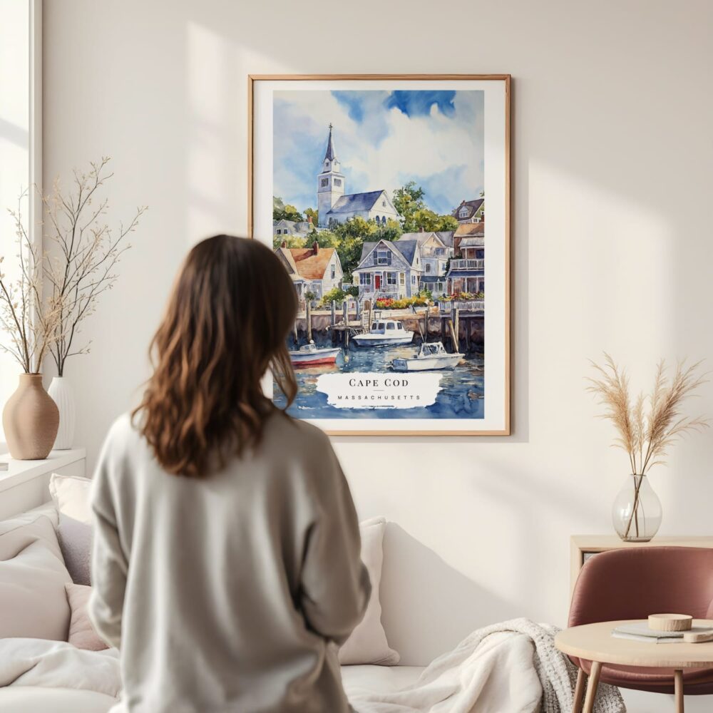 Framed Cape Cod Watercolor Wall Art - In Living Room with Woman Looking at it - Portrait Framed Cape Cod Watercolor Wall Art - In Living Room with Woman Looking at it - Portrait