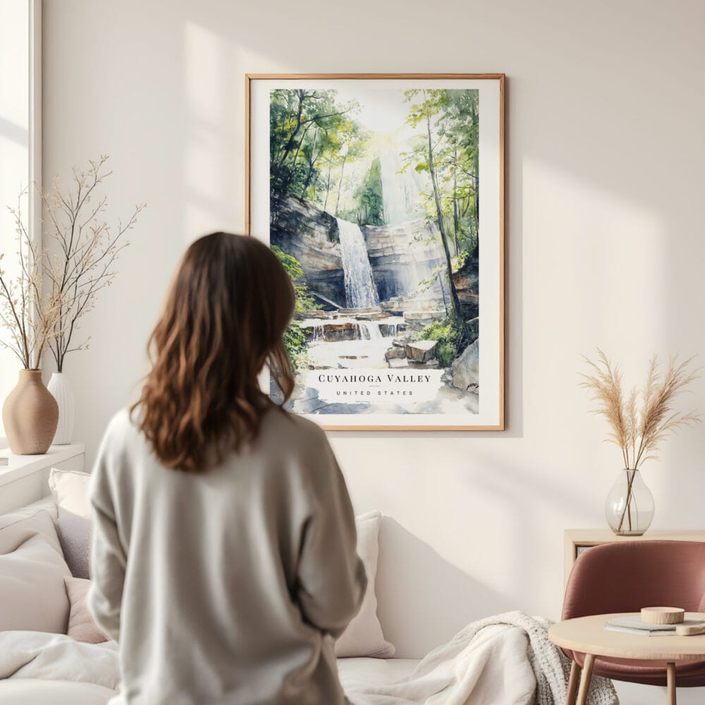 Framed Cuyahoga Valley National Park Watercolor Wall Art - In Living Room with Woman Looking at it - Portrait Framed Cuyahoga Valley National Park Watercolor Wall Art - In Living Room with Woman Looking at it - Portrait