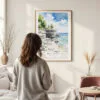 Framed Door County Wisconsin Watercolor Wall Art - In Living Room with Woman Looking at it - Portrait