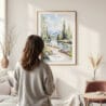 Framed Fairbanks Alaska Nature Watercolor Wall Art - In Living Room with Woman Looking at it - Portrait