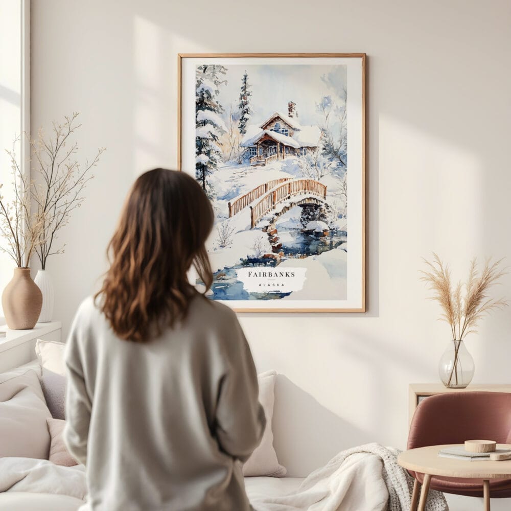 Framed Fairbanks Alaska Winter Watercolor Wall Art - In Living Room with Woman Looking at it - Portrait Framed Fairbanks Alaska Winter Watercolor Wall Art - In Living Room with Woman Looking at it - Portrait