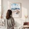 Framed Great Sand Dunes Colorado Watercolor Wall Art - In Living Room with Woman Looking at it - Portrait