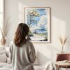 Framed Hawaii Volcanoes National Park Watercolor Wall Art - In Living Room with Woman Looking at it - Portrait
