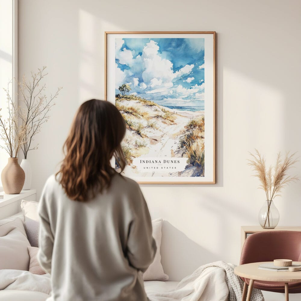Framed Indiana Dunes National Park Watercolor Wall Art - In Living Room with Woman Looking at it - Portrait Framed Indiana Dunes National Park Watercolor Wall Art - In Living Room with Woman Looking at it - Portrait