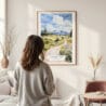 Framed Jackson Hole Nature Watercolor Wall Art - In Living Room with Woman Looking at it - Portrait