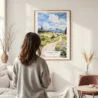 Framed Jackson Hole Nature Watercolor Wall Art - In Living Room with Woman Looking at it - Portrait