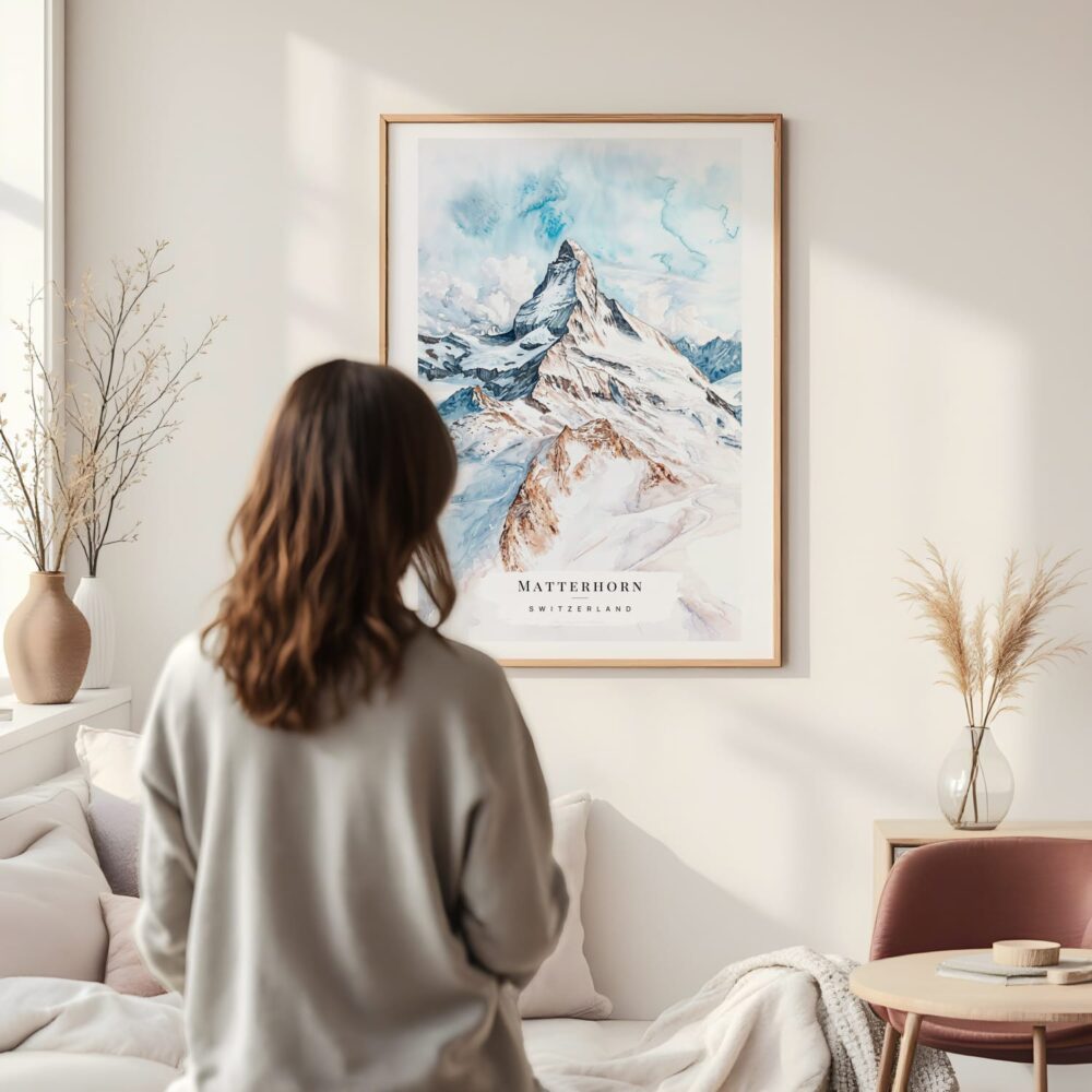 Framed Matterhorn Watercolor Wall Art - In Living Room with Woman Looking at it - Portrait Framed Matterhorn Watercolor Wall Art - In Living Room with Woman Looking at it - Portrait