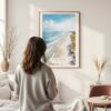 Framed Outer Banks NC Watercolor Wall Art - In Living Room with Woman Looking at it - Portrait