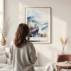 Framed Shenandoah National Park Watercolor Wall Art - In Living Room with Woman Looking at it - Portrait