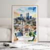 01 - Framed Denver Colorado Skyline Watercolor Wall Art leaning against couch - Portrait