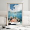 01 - Framed Great Barrier Reef Watercolor Wall Art leaning against couch - Portrait