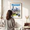 03 - Framed Atlanta Skyline Watercolor Wall Art - In Living Room with Woman Looking at it - Portrait