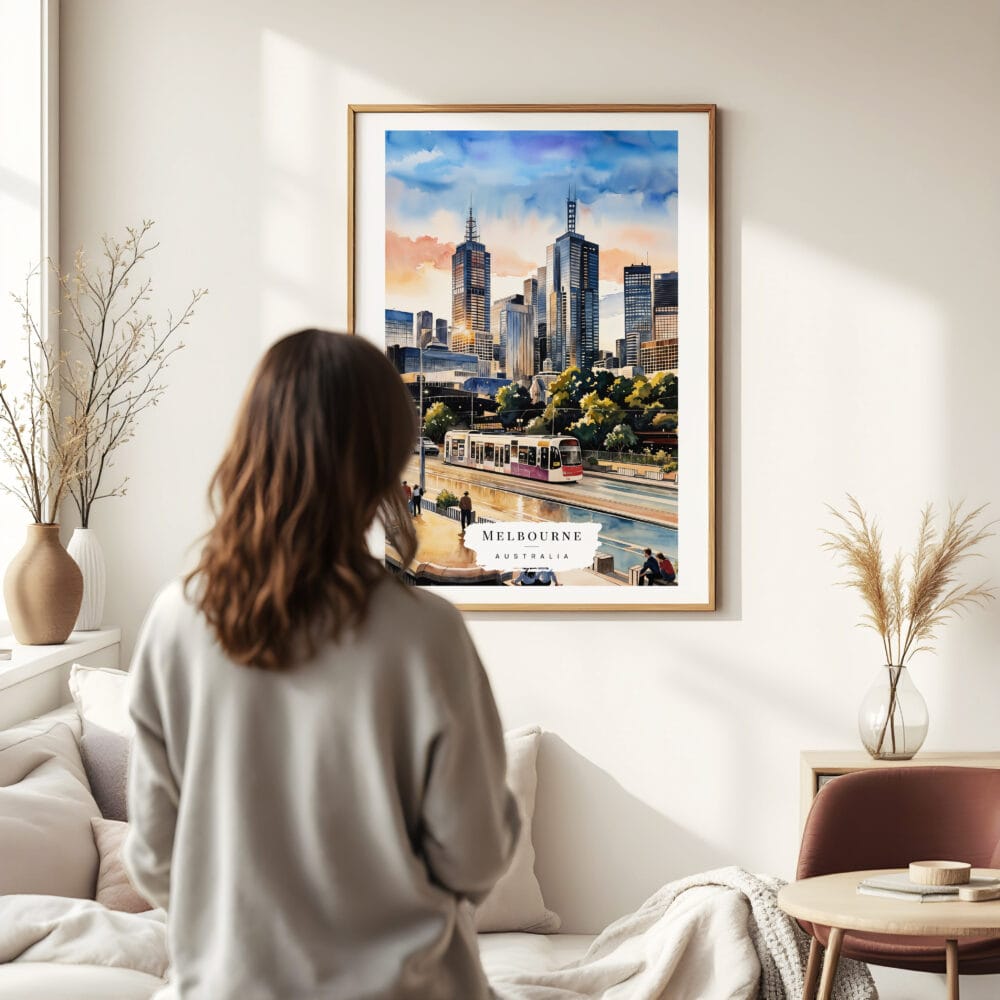 03 - Framed Melbourne Watercolor Wall Art - In Living Room with Woman Looking at it - Portrait 03 - Framed Melbourne Watercolor Wall Art - In Living Room with Woman Looking at it - Portrait
