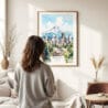 03 - Framed Portland Oregon Watercolor Wall Art - In Living Room with Woman Looking at it - Portrait