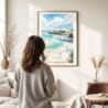 03 - Framed San Diego Beach Watercolor Wall Art - In Living Room with Woman Looking at it - Portrait