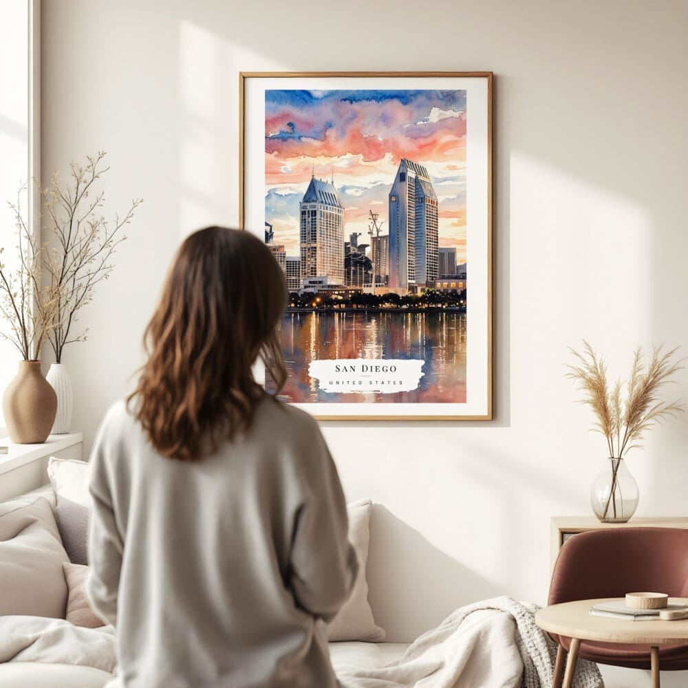 03 - Framed San Diego Skyline Watercolor Wall Art - In Living Room with Woman Looking at it - Portrait 03 - Framed San Diego Skyline Watercolor Wall Art - In Living Room with Woman Looking at it - Portrait