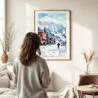 03 - Framed Telluride Colorado Watercolor Wall Art - In Living Room with Woman Looking at it - Portrait