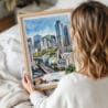 05 - Woman Holding Framed Seoul Skyline Watercolor Wall Art - Portrait