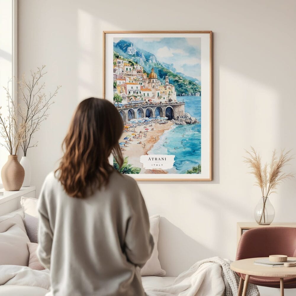 Framed Atrani Italy Watercolor Wall Art - In Living Room with Woman Looking at it - Portrait Framed Atrani Italy Watercolor Wall Art - In Living Room with Woman Looking at it - Portrait