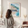 Framed Atrani Italy Watercolor Wall Art - In Living Room with Woman Looking at it - Portrait