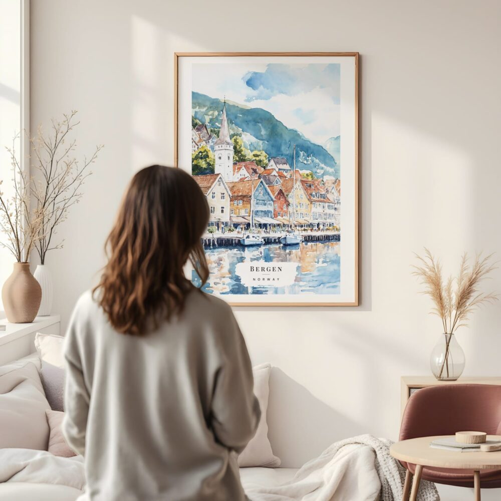 Framed Bergen Norway Waterfront Watercolor Wall Art - In Living Room with Woman Looking at it - Portrait Framed Bergen Norway Waterfront Watercolor Wall Art - In Living Room with Woman Looking at it - Portrait