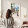 Framed Bogota Colombia Watercolor Wall Art - In Living Room with Woman Looking at it - Portrait