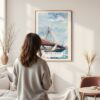 Framed Boston Zakim Bridge Watercolor Wall Art - In Living Room with Woman Looking at it - Portrait