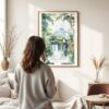 Framed Costa Rica Arenal Vulcano Watercolor Wall Art - In Living Room with Woman Looking at it - Portrait