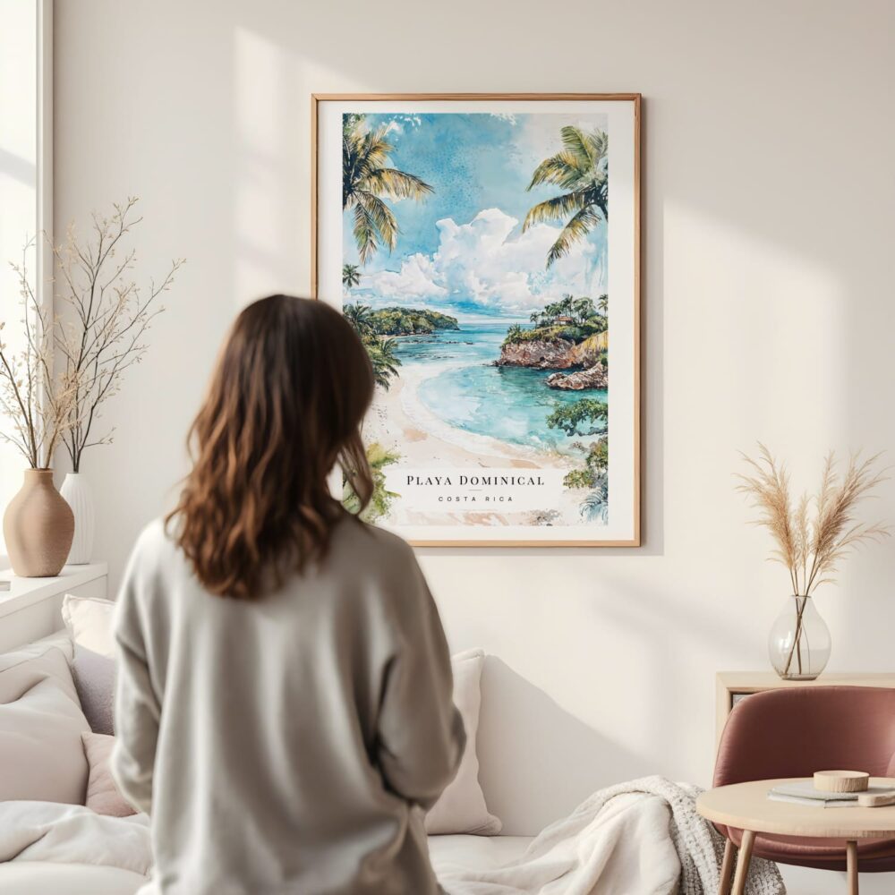 Framed Costa Rica Playa Dominical Watercolor Wall Art - In Living Room with Woman Looking at it - Portrait Framed Costa Rica Playa Dominical Watercolor Wall Art - In Living Room with Woman Looking at it - Portrait