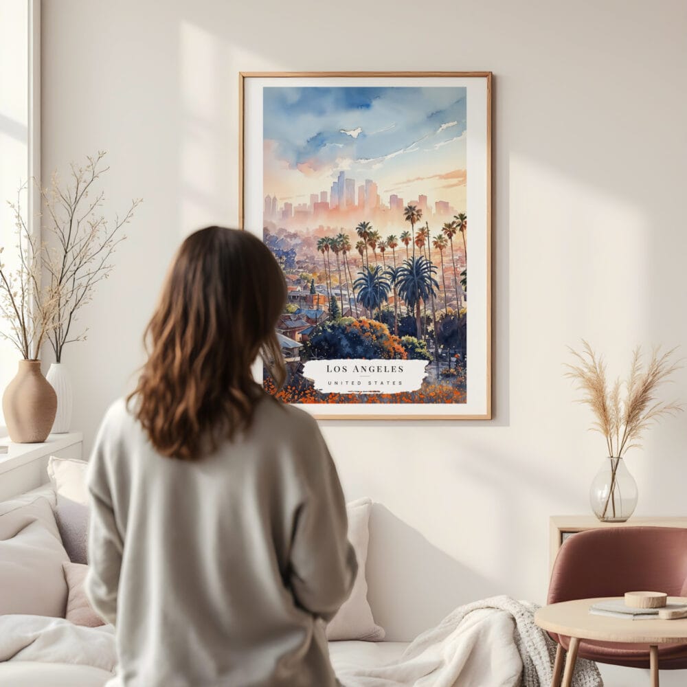 Framed Los Angeles Skyline Watercolor Wall Art - In Living Room with Woman Looking at it - Portrait Framed Los Angeles Skyline Watercolor Wall Art - In Living Room with Woman Looking at it - Portrait