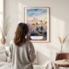 Framed Los Angeles Skyline Watercolor Wall Art - In Living Room with Woman Looking at it - Portrait