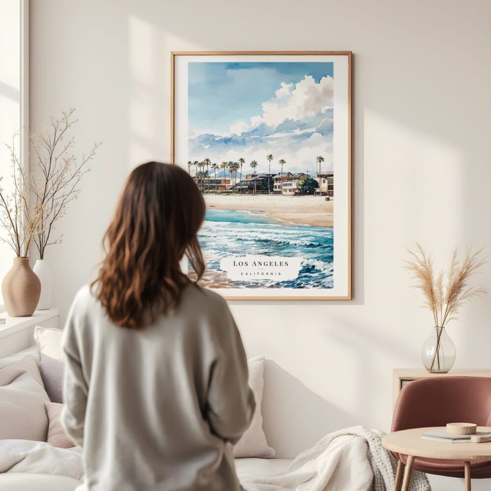 Framed Los Angeles Waterfront Watercolor Wall Art - In Living Room with Woman Looking at it - Portrait Framed Los Angeles Waterfront Watercolor Wall Art - In Living Room with Woman Looking at it - Portrait