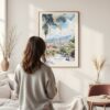 Framed Medellin Colombia Skyline Watercolor Wall Art - In Living Room with Woman Looking at it - Portrait