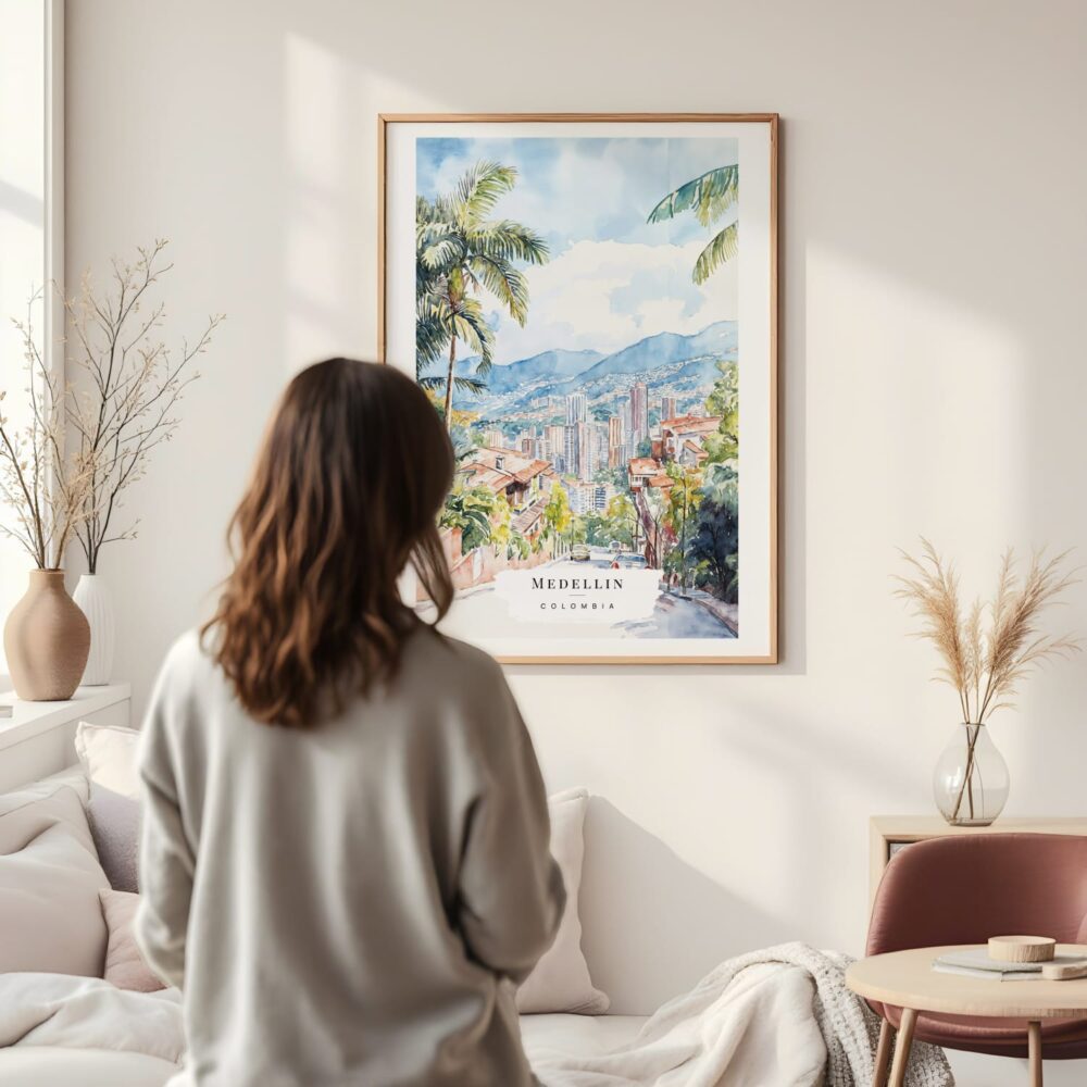 Framed Medellin Colombia Watercolor Wall Art - In Living Room with Woman Looking at it - Portrait Framed Medellin Colombia Watercolor Wall Art - In Living Room with Woman Looking at it - Portrait