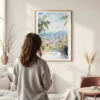 Framed Medellin Colombia Watercolor Wall Art - In Living Room with Woman Looking at it - Portrait
