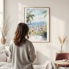 Framed Medellin Colombia Watercolor Wall Art - In Living Room with Woman Looking at it - Portrait