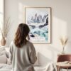 Framed Patagonia Torres Del Paines Watercolor Wall Art - In Living Room with Woman Looking at it - Portrait