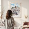 Framed Rio De Janeiro Favela Watercolor Wall Art - In Living Room with Woman Looking at it - Portrait