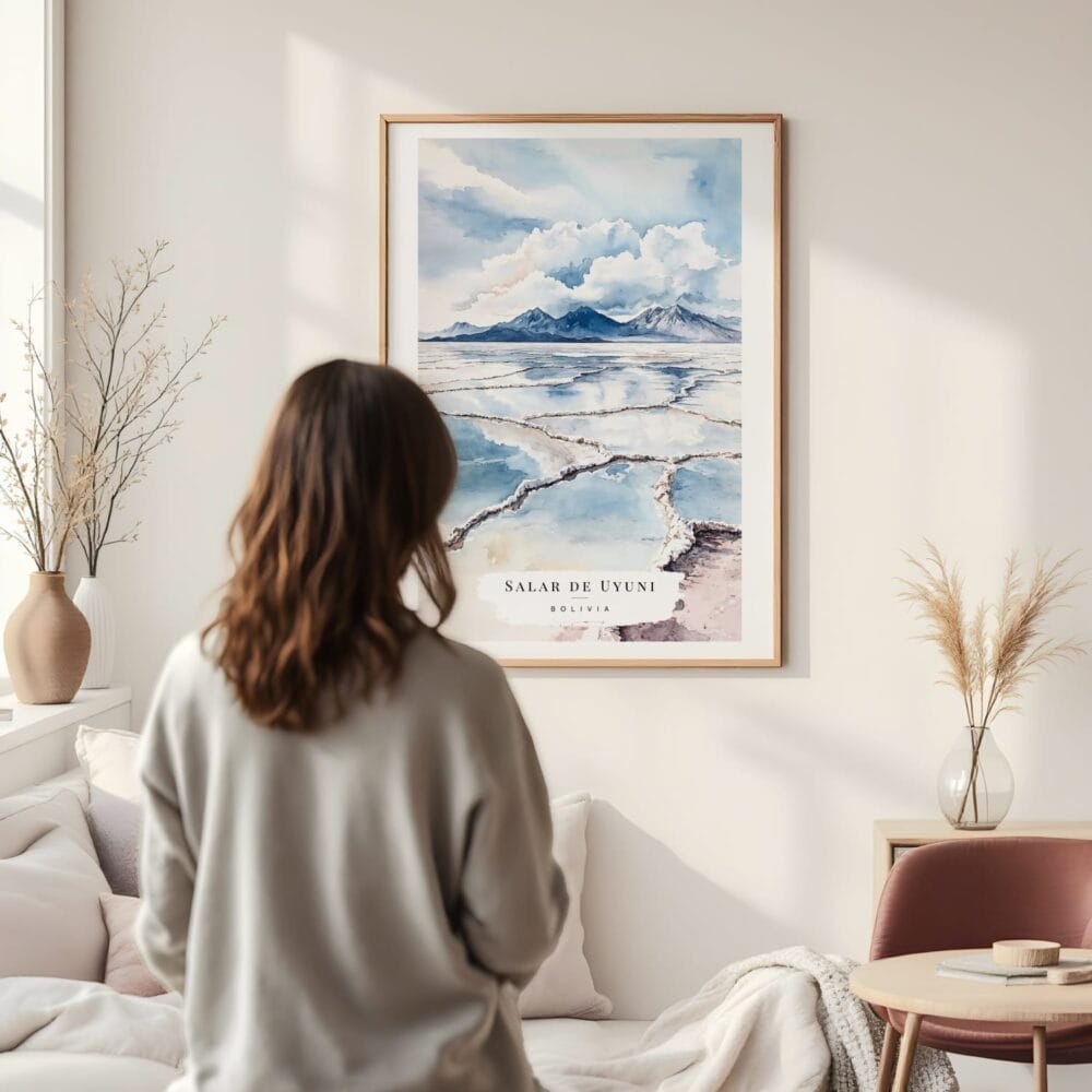 Framed Salar de Uyuni Watercolor Wall Art - In Living Room with Woman Looking at it - Portrait Framed Salar de Uyuni Watercolor Wall Art - In Living Room with Woman Looking at it - Portrait