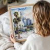 Woman Holding Framed Los Angeles Downtown Watercolor Wall Art - Portrait