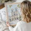 Woman Holding Framed Notre Dame Cathedral Watercolor Wall Art - Portrait