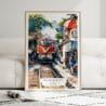01 - Framed Hanoi Train Street Vietnam Watercolor Wall Art leaning against couch - Portrait.jpg