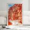 01 - Framed Petra Jordan Watercolor Wall Art leaning against couch - Portrait.jpg