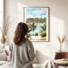 03 - Framed Bern Switzerland Watercolor Wall Art - In Living Room with Woman Looking at it - Portrait.jpg