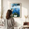 03 - Framed Capri Italy Watercolor Wall Art - In Living Room with Woman Looking at it - Portrait.jpg